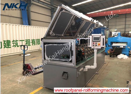 comprar Rollo de alta velocidad del casquillo de Ridge del tejado del metal que forma la máquina con el refuerzo de grabación en relieve online manufacture